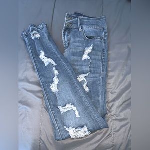 • Almost Famous Ripped Jeans, Blue jeans. •